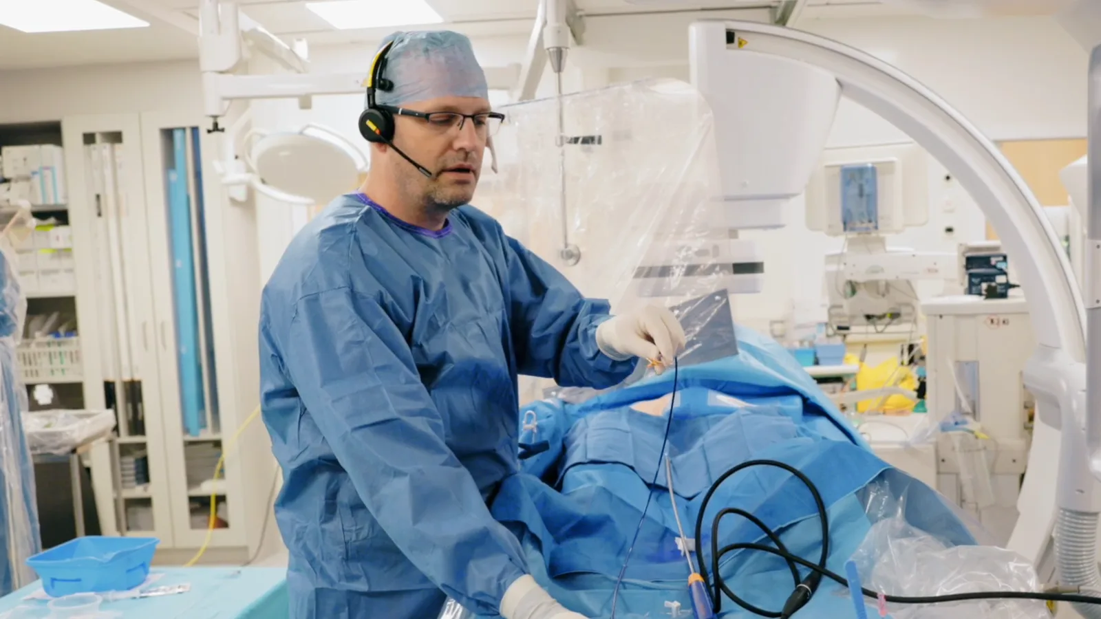 A physician performing a live procedure in the cath lab at the Mater Private.